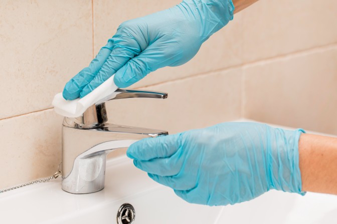 Sanitizing Bathrooms in apartment deep cleaning