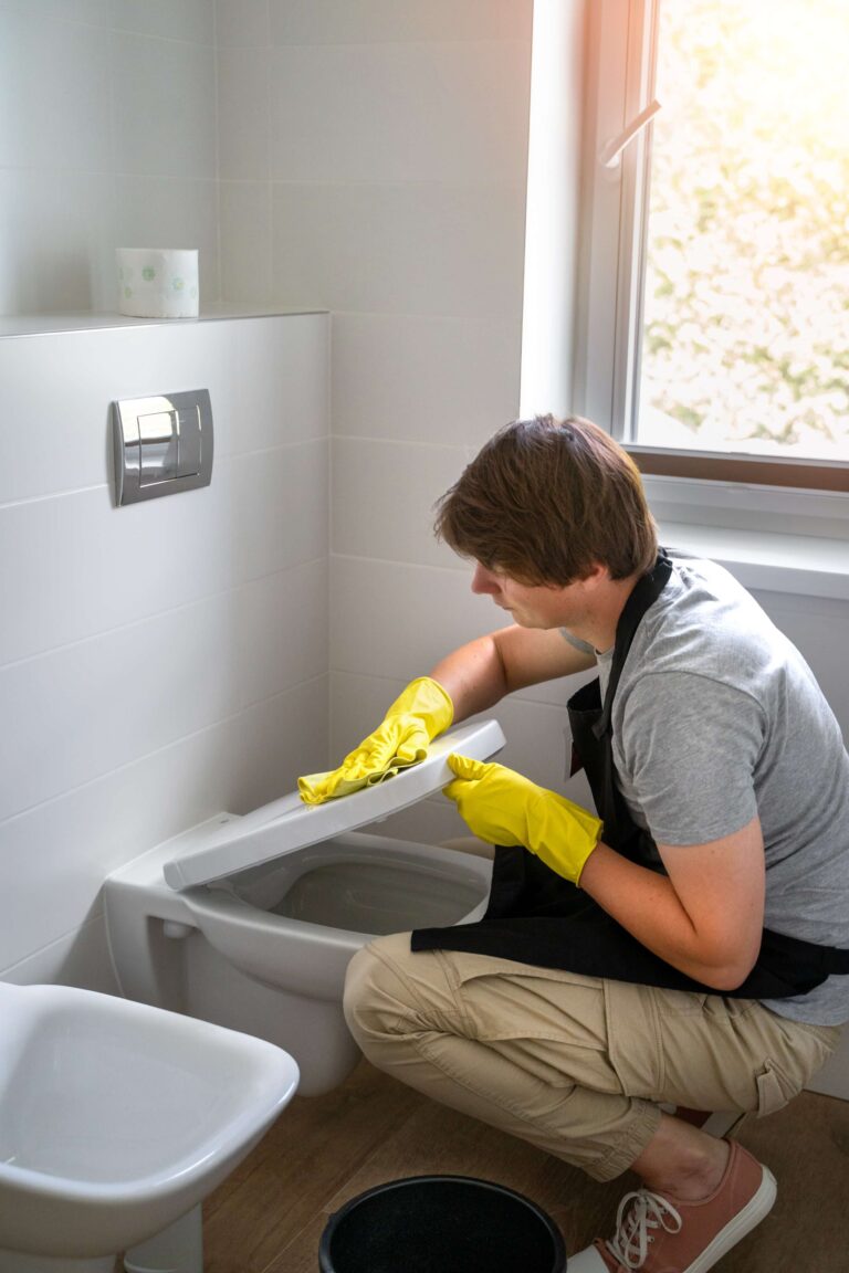 pinkclean staff deep cleaning the bathroom