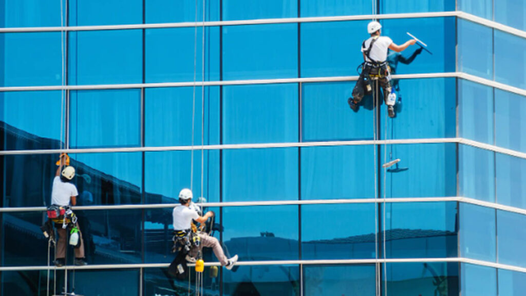 image shwowing pinkclean team providing facade cleaning service in bangalore